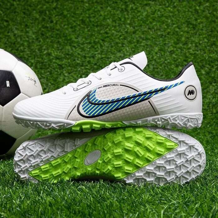 Football shoes assassin 15 air cushion long spike knitted waterproof student FG high and low Luo same style human grass training competition